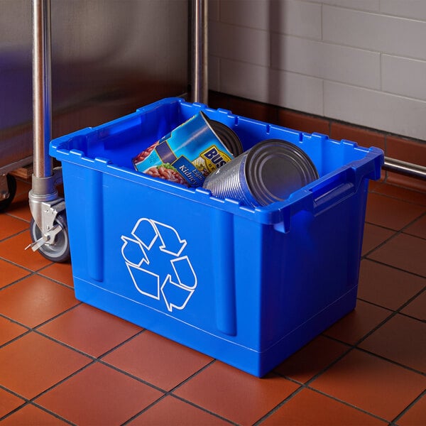 A Lavex blue rectangular recycling bin on a tile floor.