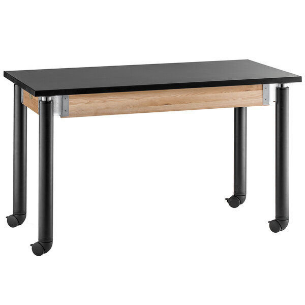 A National Public Seating science lab table with black metal legs and wheels.