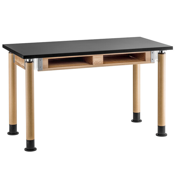 A black and wood National Public Seating science lab table with a black top.