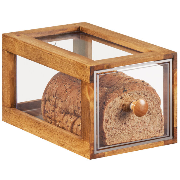 A Cal-Mil Madera bread drawer with a single loaf of bread inside.