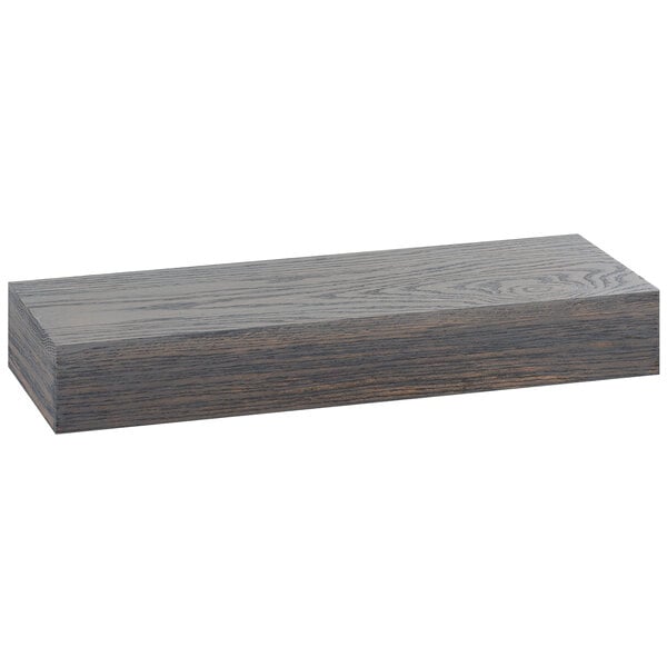 A rectangular gray oak wood riser with a black and grey finish.