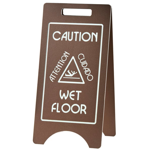 A brown Cal-Mil wet floor sign with white text that says "Caution"