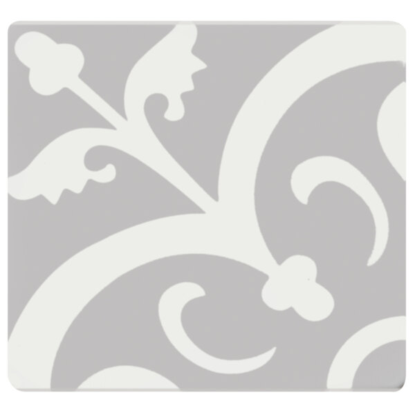 A grey and white tile with a decorative swirl design.