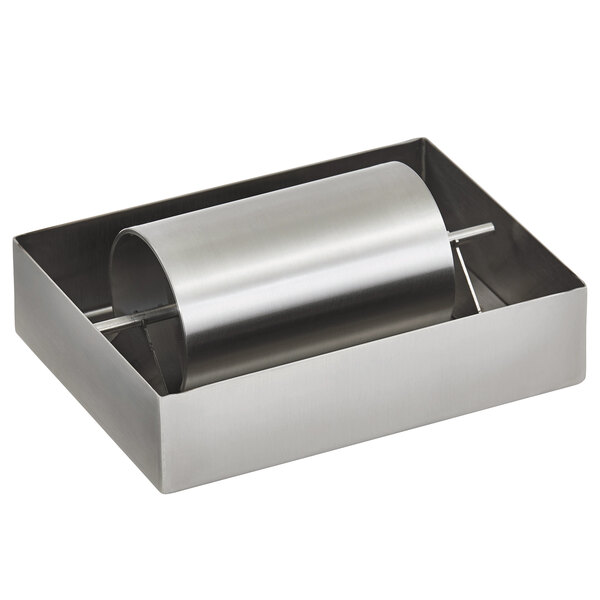 A stainless steel Vollrath butter wheel in a box with a metal tube and roller.