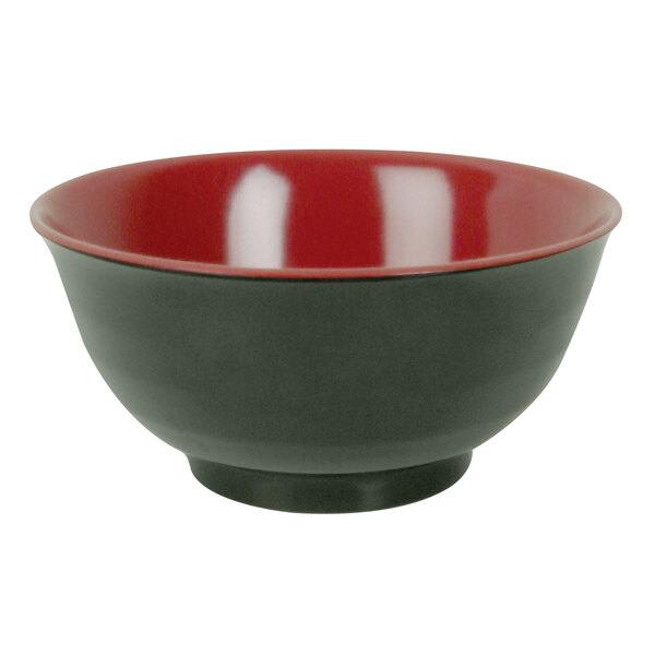 A close-up of a red and black Thunder Group melamine noodle bowl with a white background.