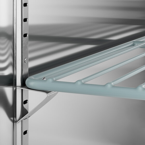 An Avantco black beer dispenser shelf with a blue metal bar on it.