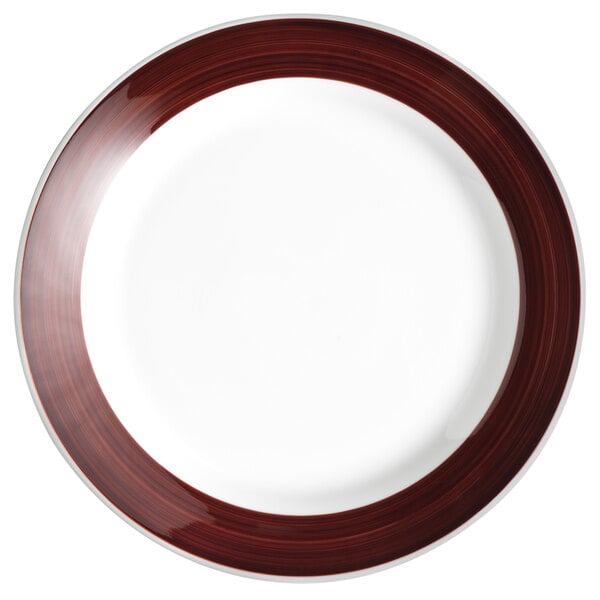 A white porcelain plate with a brown banded rim.