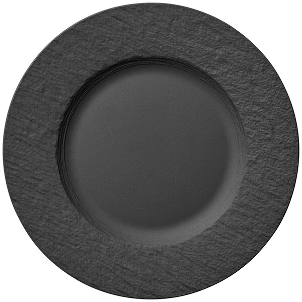 A black porcelain plate with a round gray rim.