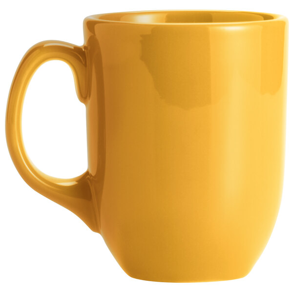 A yellow Libbey Cantina coffee mug with a handle.