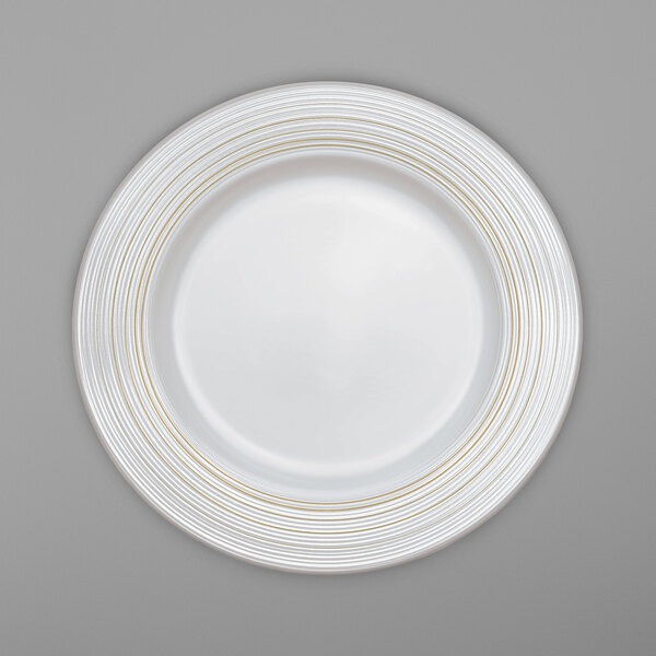 A Villeroy & Boch white bone porcelain platter with gold lines.