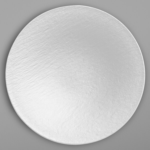 A white Villeroy & Boch porcelain plate with a round edge.
