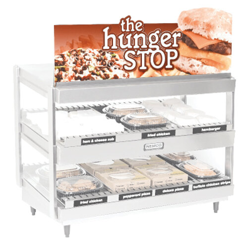 A Nemco countertop food display case with a sign on it.