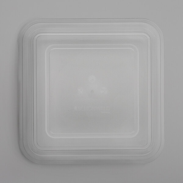 A white plastic square dish cover.