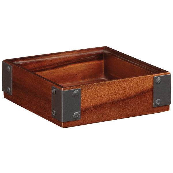 A walnut square wooden box with metal corners.