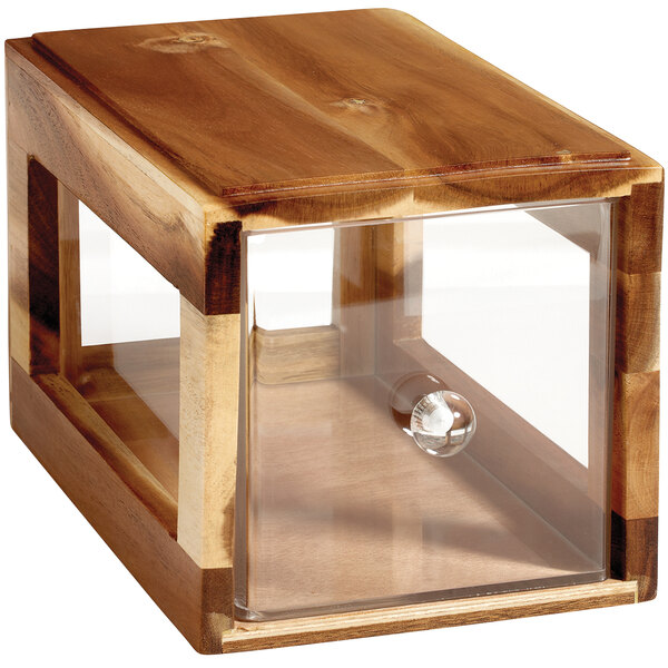 A wooden box with a clear glass lid and a clear glass object inside.