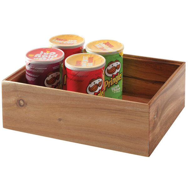 A GET Enterprises wooden rectangular display box filled with containers of potato chips.