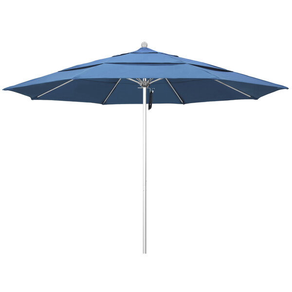 A blue California Umbrella with a silver pole.