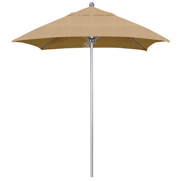 A tan California Umbrella on a silver pole.