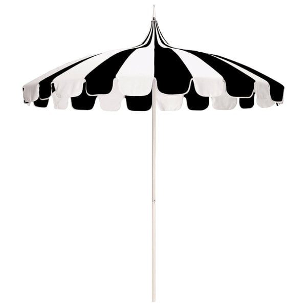 A California Umbrella with a black and natural striped Sunbrella canopy and a white pole.