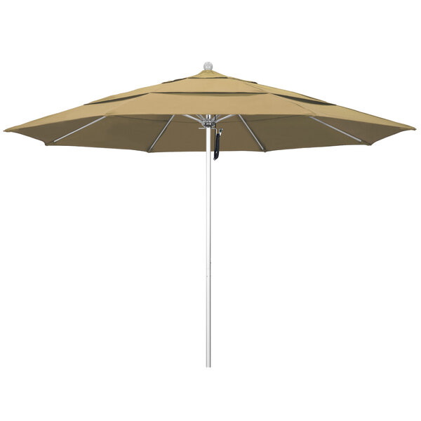 A champagne colored California Umbrella ALTO outdoor table umbrella with a silver pole.
