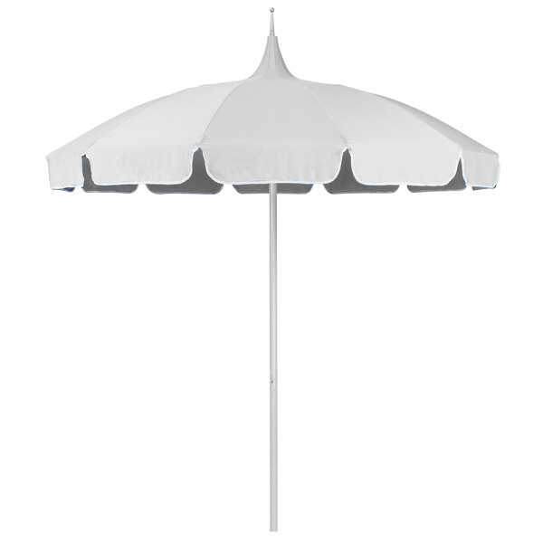 A white California Umbrella pagoda table umbrella with a white pole.