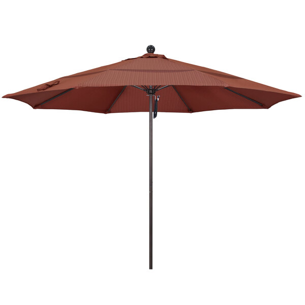 A brown California Umbrella with a bronze pole and Terrace Adobe fabric.