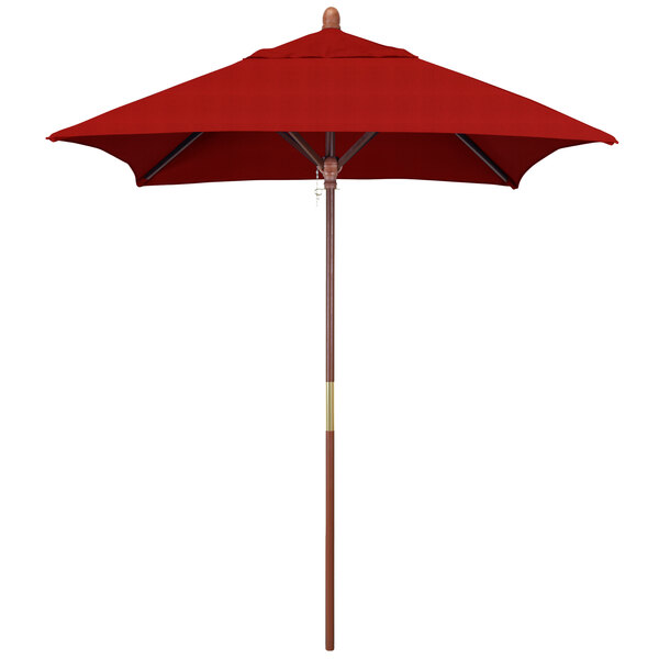 A close-up of a California Umbrella with a Jockey Red Sunbrella canopy and wooden pole.