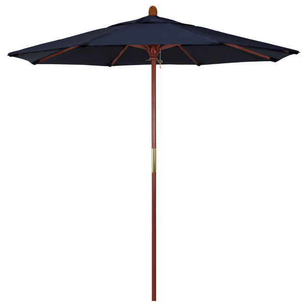 A navy blue California Umbrella with a wooden pole.