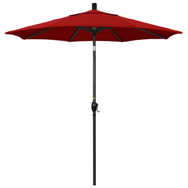A close-up of a red California Umbrella on a black pole.