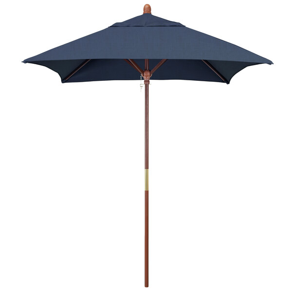 A close-up of a California Umbrella Grove square outdoor umbrella with a blue Sunbrella canopy and wooden pole.