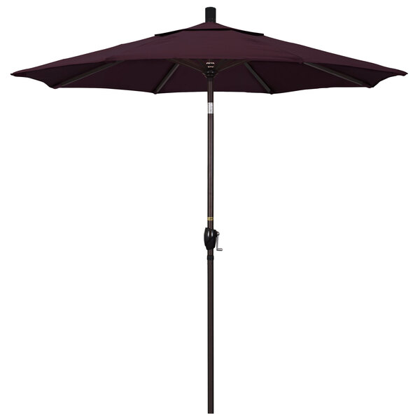 A purple California Umbrella on a bronze pole.