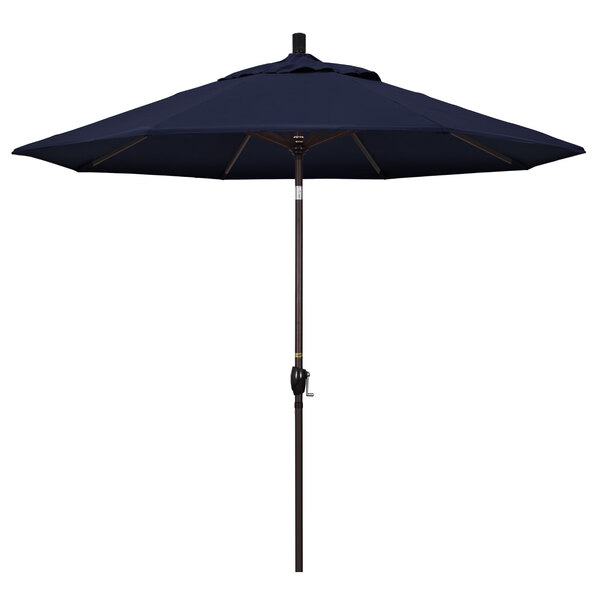 A California Umbrella Pacific Trail blue umbrella on a bronze pole.