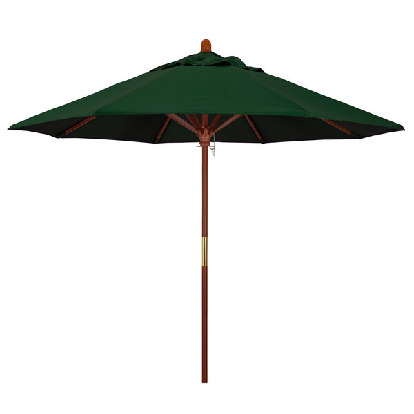 A Pacifica hunter green California Umbrella with a wooden pole.