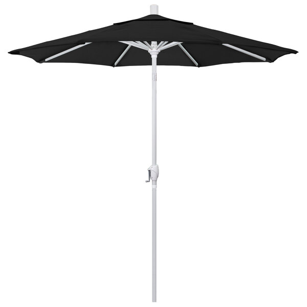A black California Umbrella on a white pole.