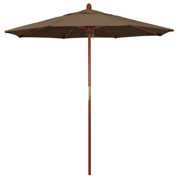A close-up of a brown California Umbrella with a wooden pole.