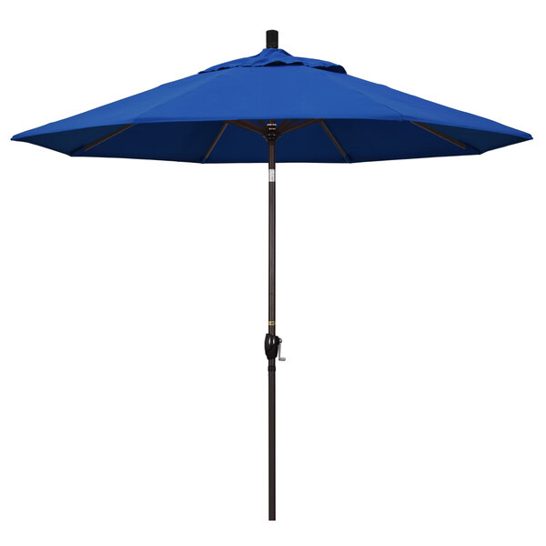 A Pacific Blue California Umbrella with a bronze aluminum pole.