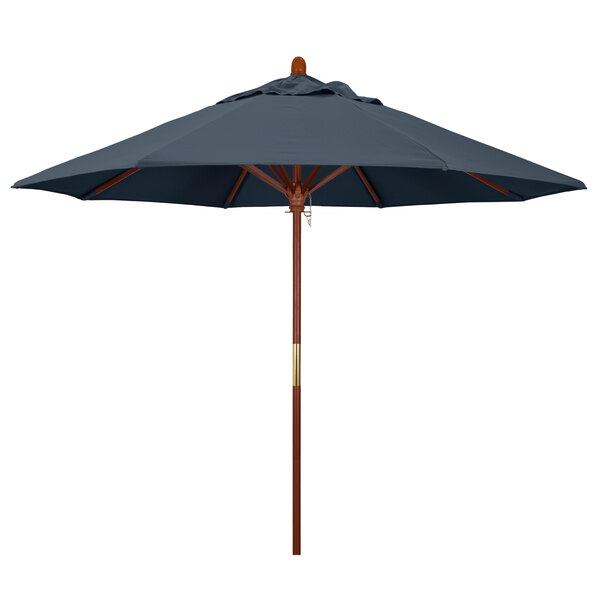 A California Umbrella with a wooden pole and Sapphire blue canopy.