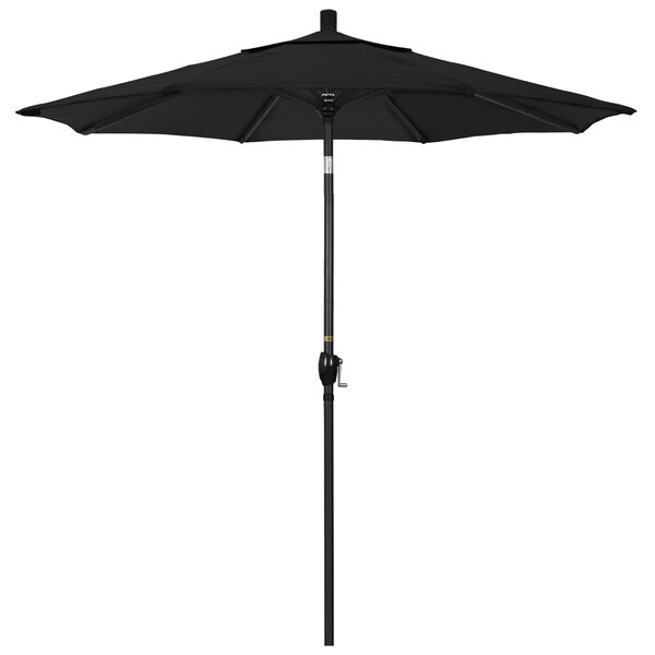 A black California Umbrella on a stone black aluminum pole.