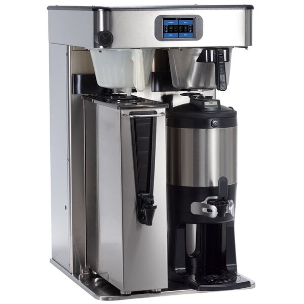 A Bunn coffee and tea brewer with black and silver stainless steel finish and white covers.