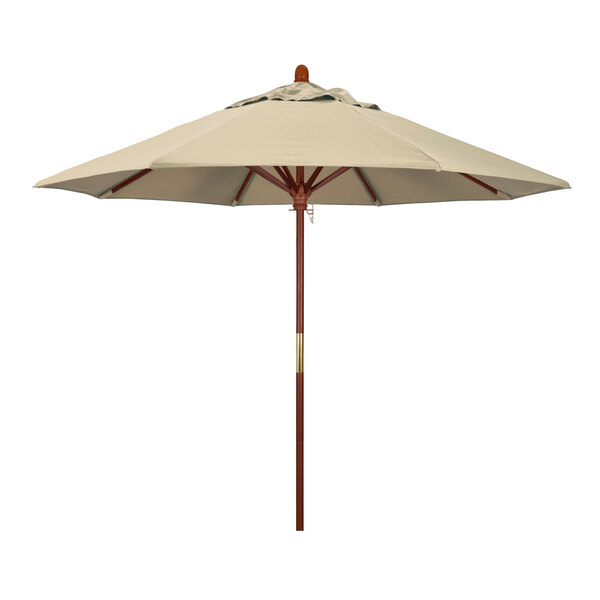 A close-up of a California Umbrella with a Sunbrella antique beige canopy and wooden pole.