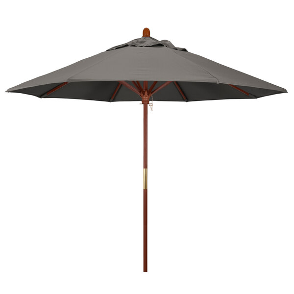 A taupe California Umbrella with a wooden pole.