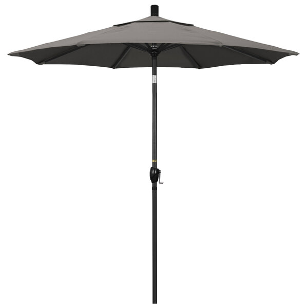 A taupe California Umbrella with a black pole.