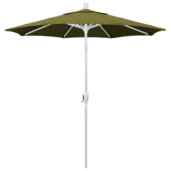 A green California Umbrella on a white pole.
