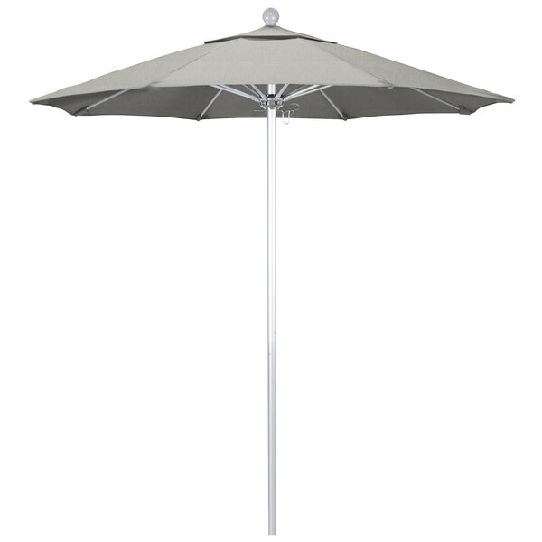 A grey California Umbrella with a Sunbrella granite canopy on a silver pole.