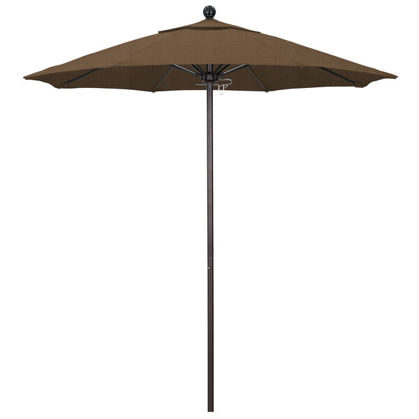 A brown California Umbrella with a bronze pole.