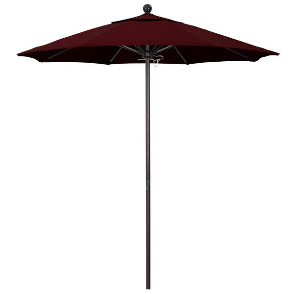 A California Umbrella Pacifica burgundy canopy on a bronze pole.