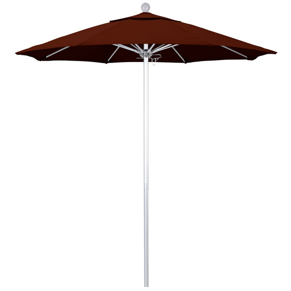 A close-up of a red California Umbrella with a brick red canopy.