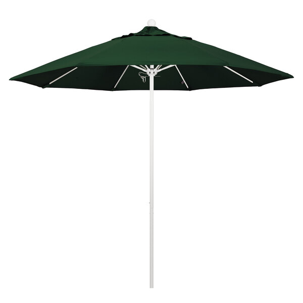 A green umbrella with a white pole.