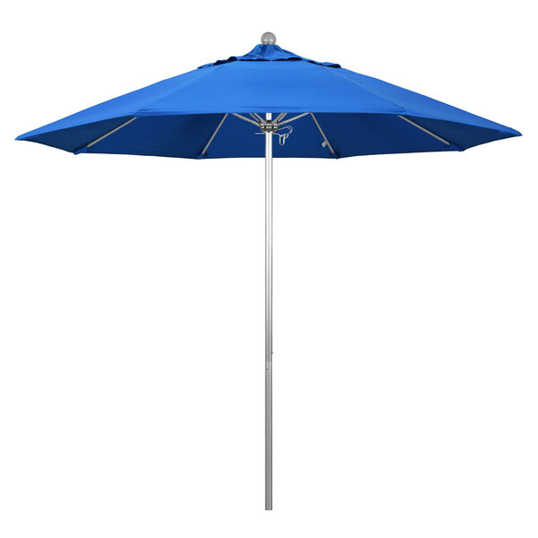 A California Umbrella with royal blue fabric on a silver pole.