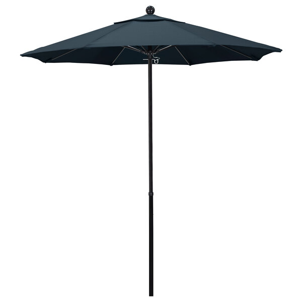 A California Umbrella black round umbrella with a wooden pole and blue canopy on a white background.